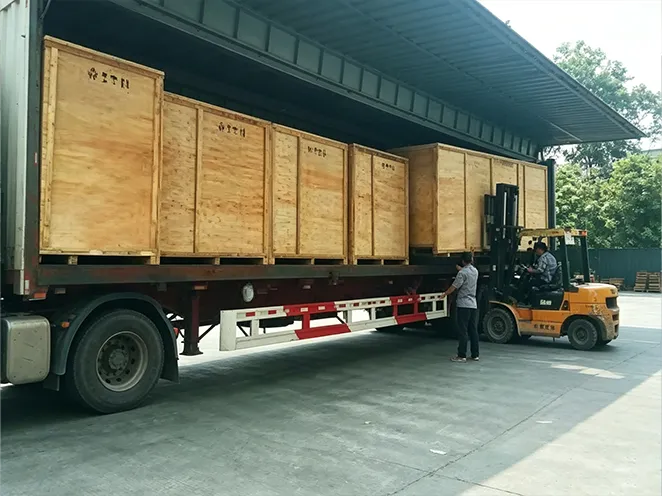 Packed vending machines being loaded for delivery