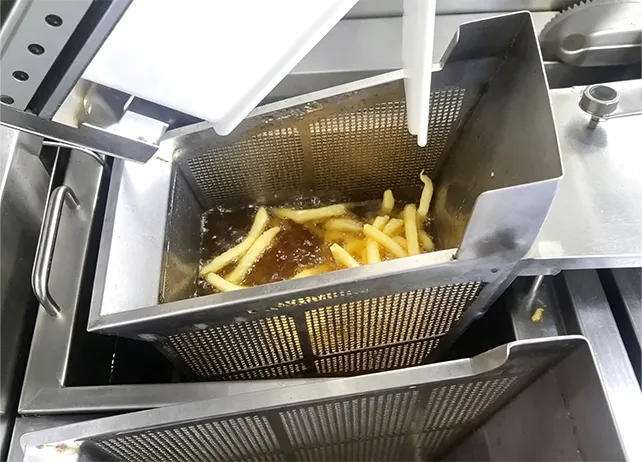 French fries being cooked automatically