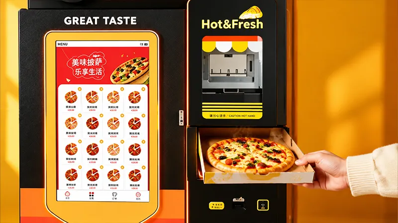 Hot pizza pickup from the pizza vending machine